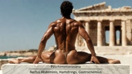 Paschimottanasana. Seated-Forward-Bend. Yogi. Greek athlete, sweaty muscle yoga on wet marble 1m20s